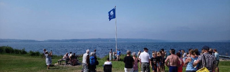 Mennesker på en strand
