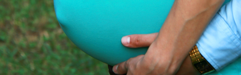 Billed af en højgravid kvinde