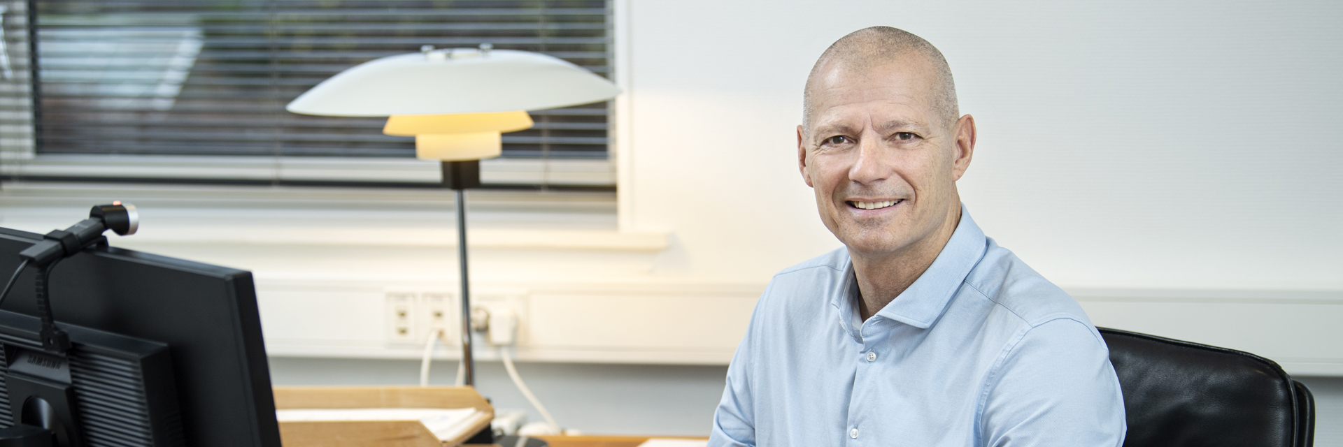 Borgmester Ole Vind sidder ved sit skrivebord Borgmester Ole Vind sidder ved sit skrivebord